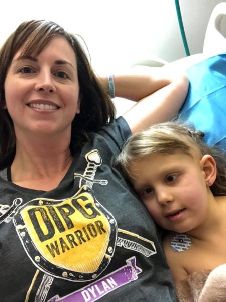 DIPG warrior and mother in hospital bed 