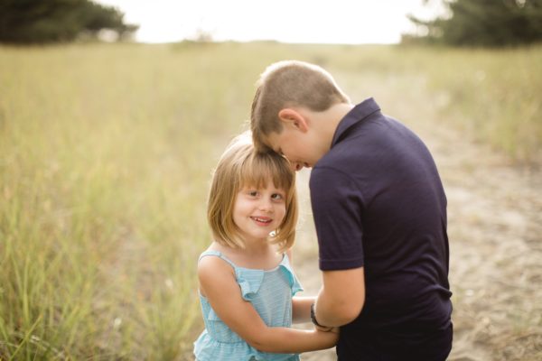 mason and dylan in dune grass