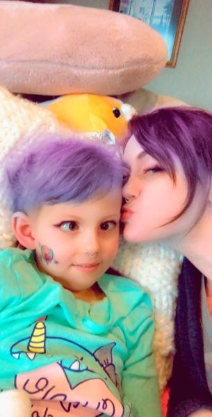 Aunt Jamie and Dylan with snapchat filter giving purple hair